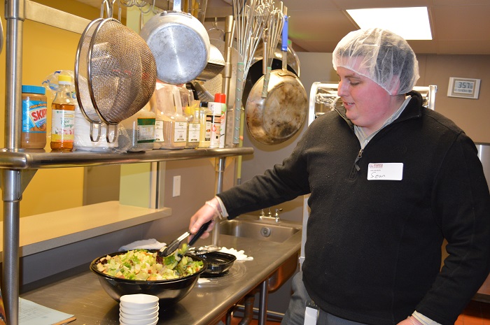 Brooks Instrument team serves at Manna on Main Street